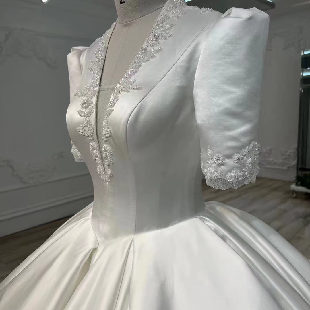 Nine Seven Appliques Plunging V-Neck Half Sleeves Ball Grown Satin Court Wedding Dress